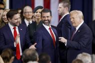 Donald Trump with Donald Trump Jr. and JD Vance (Image via Getty)